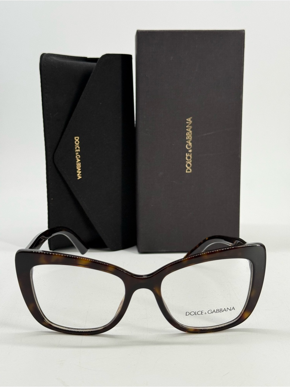 Dolce & Gabbana Tortoiseshell Cat-Eye Glasses in Brown and Amber